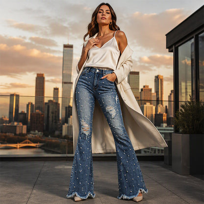Dames high-waisted distressed flare jeans