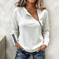 Damesgebreide top met ribstructuur en asymmetrische rits