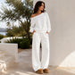 Set bestaande uit een casual off-shoulder top en een broek met wijde pijpen voor dames