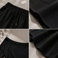 Set bestaande uit een casual off-shoulder top en een broek met wijde pijpen voor dames
