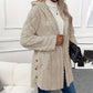 Damesjas met capuchon en knopen