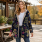 Vintage damesjas met capuchon en bladmotief