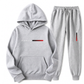 Heren Ontspannen Fit Letterprint Pullover Hoodie en Lange Broek Trainingspak Set